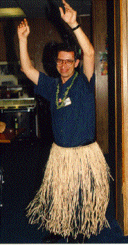 (camilow) in a grass skirt