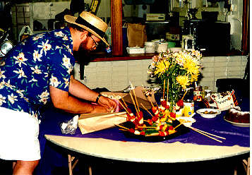 A table full of 
food and flowers