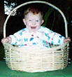 128x128 gif image of cute baby in a basket