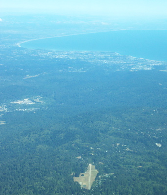 Looking south from 4000' above Bonny Doon with Santa Cruz and the Monterey Bay in the dfistance