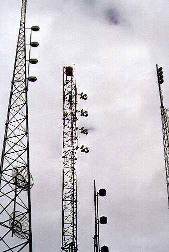 Rusty Hignite is the small shape behind the new antennas inside the tower