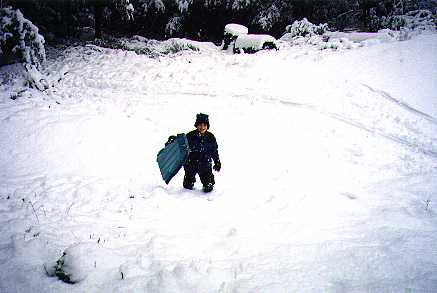 Adam with snow up to his knees. 2/12/01