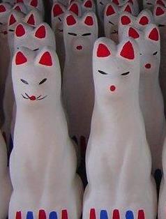 Inari statues.