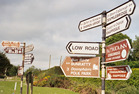 typical signs at an Irish intersection