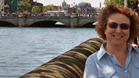 Pam standing by Liffey River in Dublin