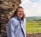 me standing by a castle wall