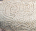 a very famous and interesting stone at the New Grange tomb